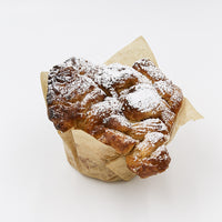 Cinnamon Sugar Monkey bread sitting on a white background.