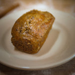 Earl Grey Tea Cake on a plate in a bakery.