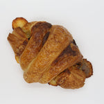 Ham and Gruyere Croissant on white background.