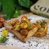 Tomato Puff Pastry on a baker's bench with flour.