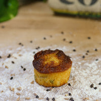 Anaheim Corn Cake on a bakers bench with flour.